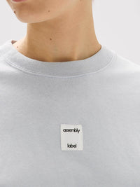 ASSEMBLY LABEL EXHIBIT PATCH SHORT SLEEVE TEE